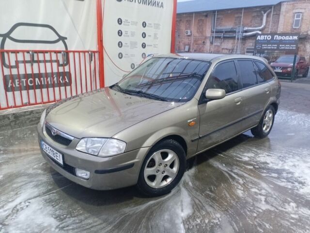 Сірий Мазда 323, об'ємом двигуна 1.8 л та пробігом 300 тис. км за 3000 $, фото 1 на Automoto.ua