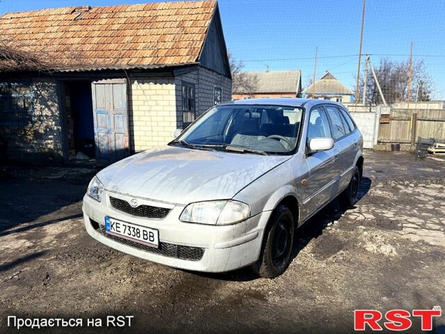 Серый Мазда 323, объемом двигателя 2 л и пробегом 284 тыс. км за 1500 $, фото 1 на Automoto.ua