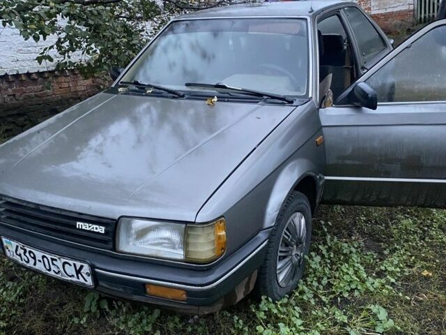 Сірий Мазда 323, об'ємом двигуна 0 л та пробігом 2 тис. км за 958 $, фото 1 на Automoto.ua