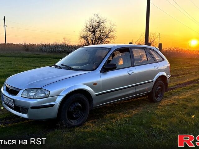 Серый Мазда 323, объемом двигателя 2 л и пробегом 250 тыс. км за 1700 $, фото 1 на Automoto.ua