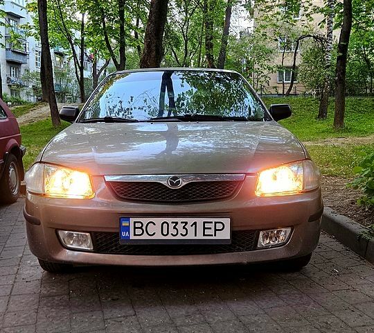 Серый Мазда 323, объемом двигателя 1.5 л и пробегом 331 тыс. км за 2300 $, фото 1 на Automoto.ua