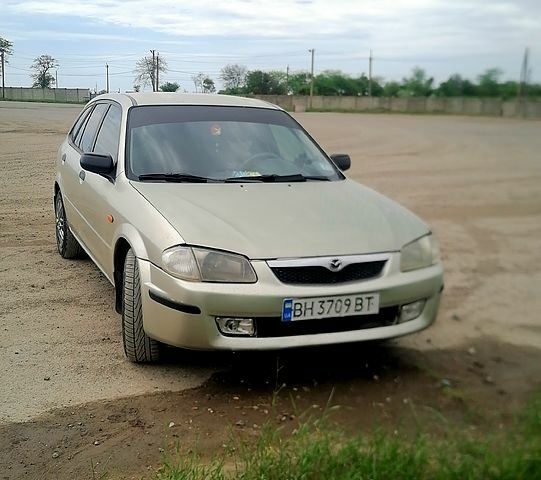 Сірий Мазда 323, об'ємом двигуна 1.5 л та пробігом 0 тис. км за 2100 $, фото 1 на Automoto.ua