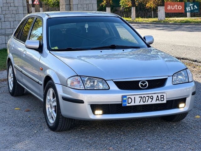 Серый Мазда 323, объемом двигателя 2 л и пробегом 430 тыс. км за 2300 $, фото 1 на Automoto.ua