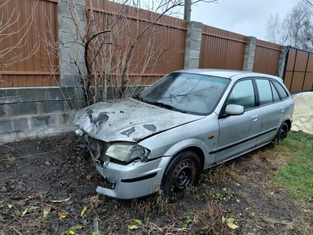 Сірий Мазда 323, об'ємом двигуна 2 л та пробігом 200 тис. км за 356 $, фото 1 на Automoto.ua