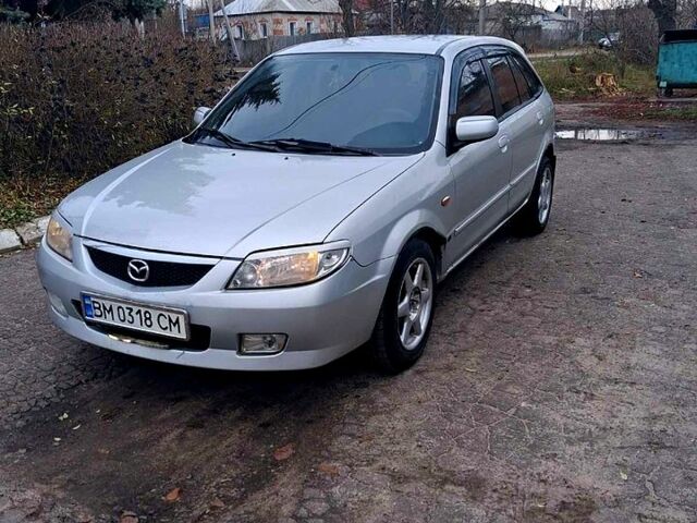 Серый Мазда 323, объемом двигателя 1.6 л и пробегом 200 тыс. км за 1800 $, фото 1 на Automoto.ua
