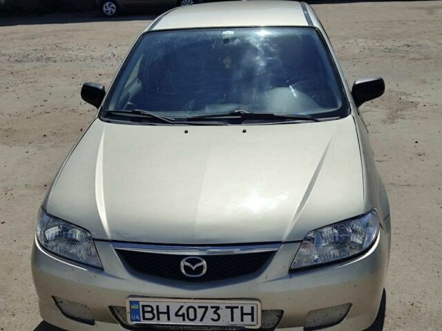 Серый Мазда 323, объемом двигателя 1.6 л и пробегом 1000 тыс. км за 2100 $, фото 1 на Automoto.ua