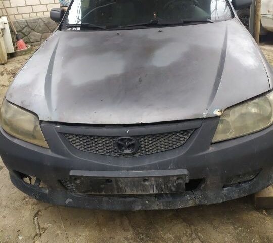 Сірий Мазда 323, об'ємом двигуна 1.6 л та пробігом 250 тис. км за 277 $, фото 1 на Automoto.ua