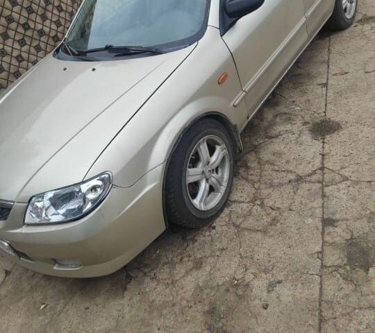 Серый Мазда 323, объемом двигателя 1.6 л и пробегом 350 тыс. км за 2500 $, фото 1 на Automoto.ua