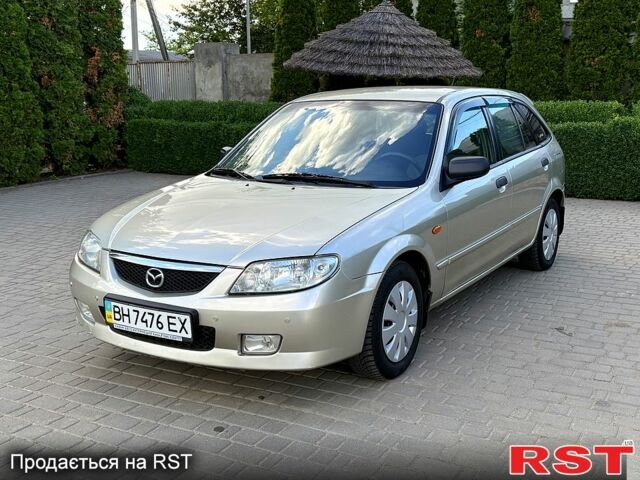 Сірий Мазда 323, об'ємом двигуна 1.6 л та пробігом 220 тис. км за 2450 $, фото 1 на Automoto.ua