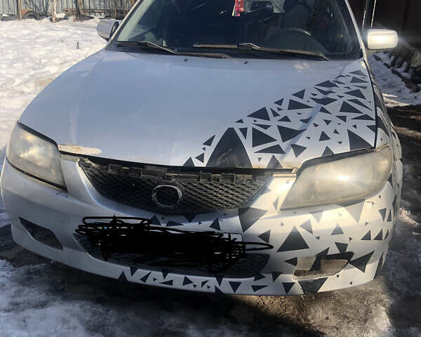 Сірий Мазда 323, об'ємом двигуна 2 л та пробігом 250 тис. км за 1000 $, фото 1 на Automoto.ua