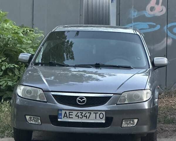 Серый Мазда 323, объемом двигателя 1.6 л и пробегом 399 тыс. км за 2500 $, фото 1 на Automoto.ua