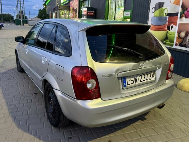 Серый Мазда 323, объемом двигателя 2 л и пробегом 341 тыс. км за 900 $, фото 1 на Automoto.ua