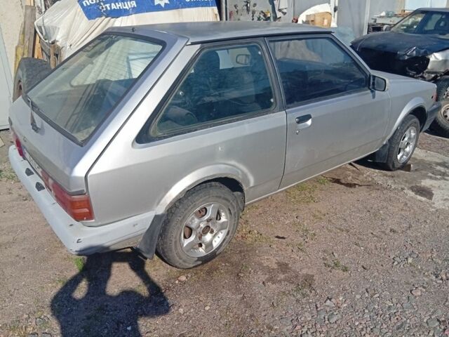 Серый Мазда 323, объемом двигателя 0 л и пробегом 123 тыс. км за 568 $, фото 1 на Automoto.ua