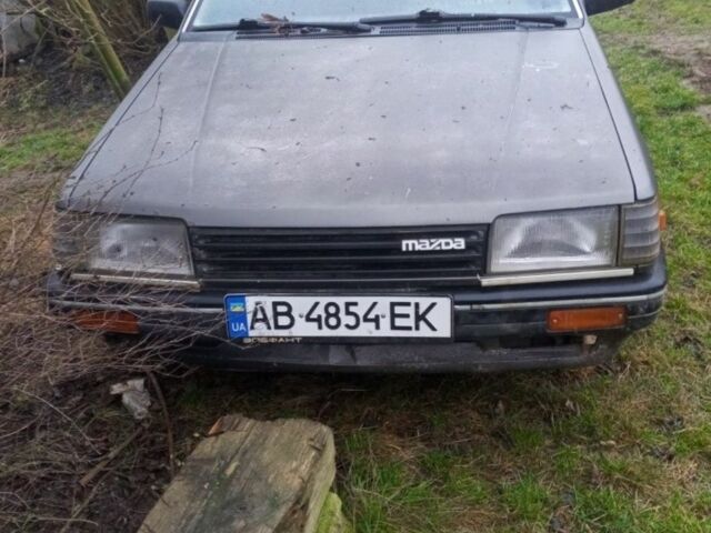Серый Мазда 323, объемом двигателя 1.5 л и пробегом 313 тыс. км за 250 $, фото 1 на Automoto.ua