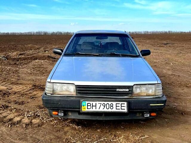 Серый Мазда 323, объемом двигателя 1.3 л и пробегом 123 тыс. км за 700 $, фото 1 на Automoto.ua