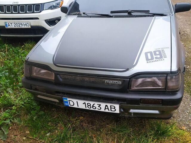 Сірий Мазда 323, об'ємом двигуна 1.7 л та пробігом 400 тис. км за 1000 $, фото 1 на Automoto.ua
