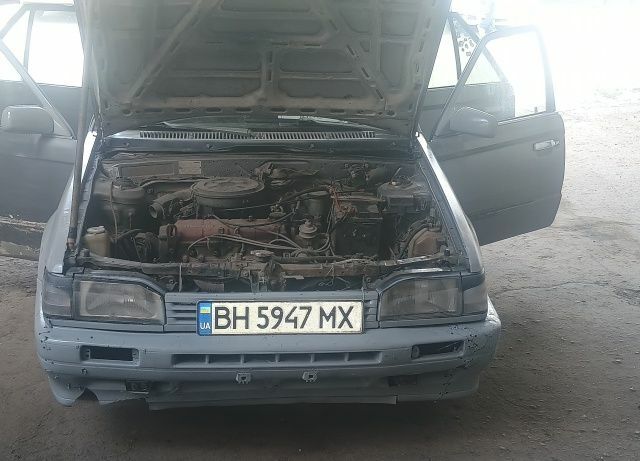 Серый Мазда 323, объемом двигателя 0 л и пробегом 350 тыс. км за 750 $, фото 1 на Automoto.ua