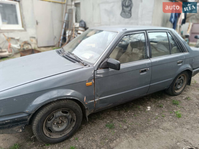 Сірий Мазда 323, об'ємом двигуна 1.7 л та пробігом 365 тис. км за 1200 $, фото 1 на Automoto.ua