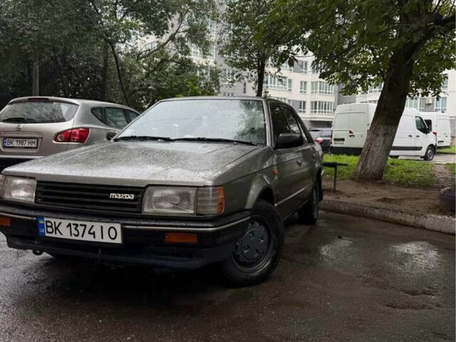 Серый Мазда 323, объемом двигателя 1.3 л и пробегом 3 тыс. км за 723 $, фото 1 на Automoto.ua
