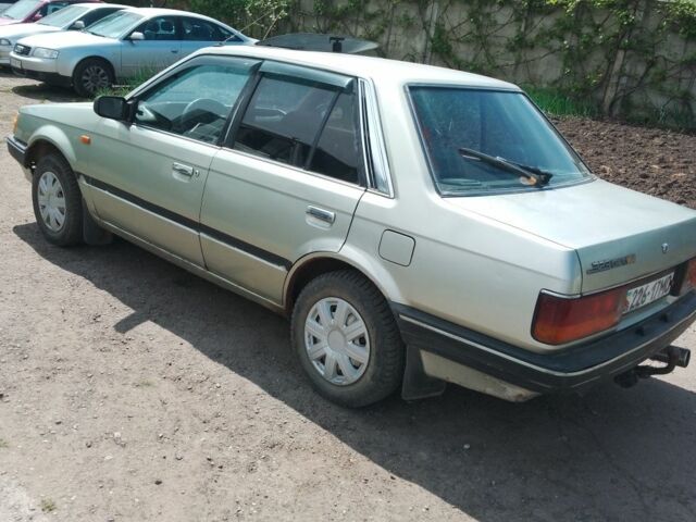 Сірий Мазда 323, об'ємом двигуна 1 л та пробігом 300 тис. км за 650 $, фото 1 на Automoto.ua