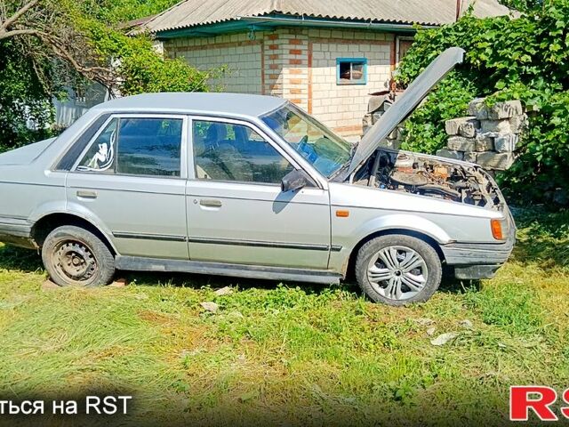 Сірий Мазда 323, об'ємом двигуна 1.3 л та пробігом 230 тис. км за 680 $, фото 1 на Automoto.ua
