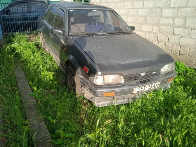 Серый Мазда 323, объемом двигателя 0 л и пробегом 999 тыс. км за 270 $, фото 1 на Automoto.ua