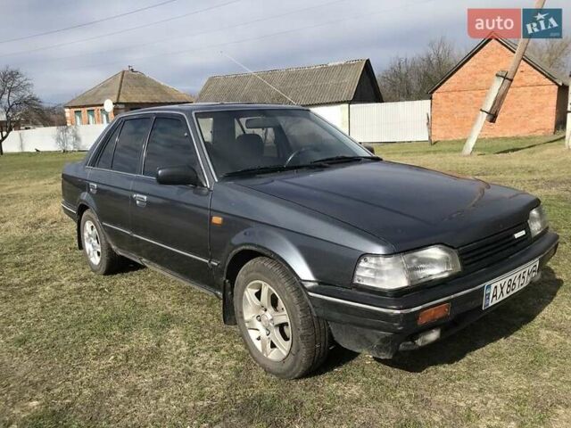 Серый Мазда 323, объемом двигателя 1.5 л и пробегом 600 тыс. км за 850 $, фото 1 на Automoto.ua