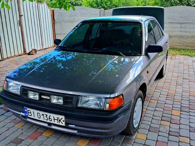 Сірий Мазда 323, об'ємом двигуна 1.6 л та пробігом 419 тис. км за 1600 $, фото 1 на Automoto.ua