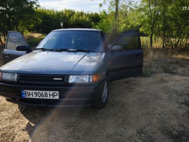 Серый Мазда 323, объемом двигателя 1.3 л и пробегом 260 тыс. км за 1600 $, фото 1 на Automoto.ua