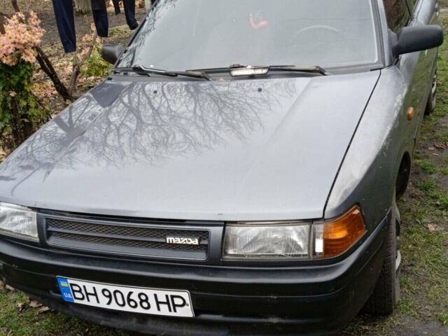Серый Мазда 323, объемом двигателя 1.3 л и пробегом 260 тыс. км за 1300 $, фото 1 на Automoto.ua