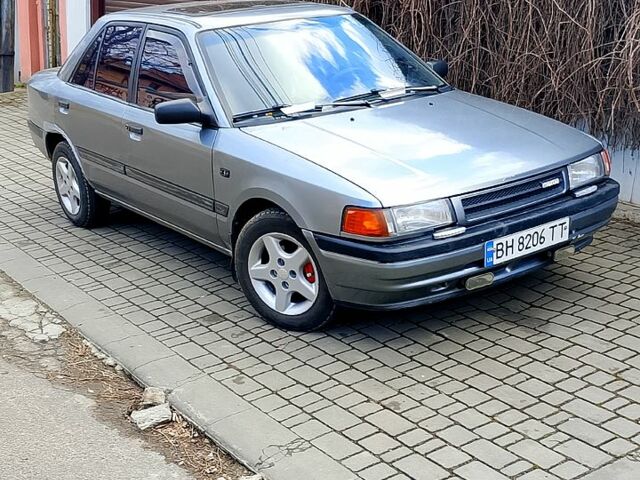 Сірий Мазда 323, об'ємом двигуна 1.6 л та пробігом 0 тис. км за 1600 $, фото 1 на Automoto.ua