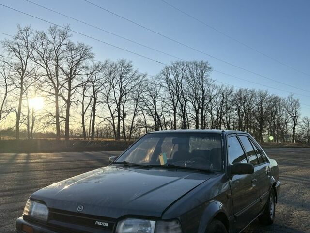Серый Мазда 323, объемом двигателя 1.4 л и пробегом 111 тыс. км за 950 $, фото 1 на Automoto.ua