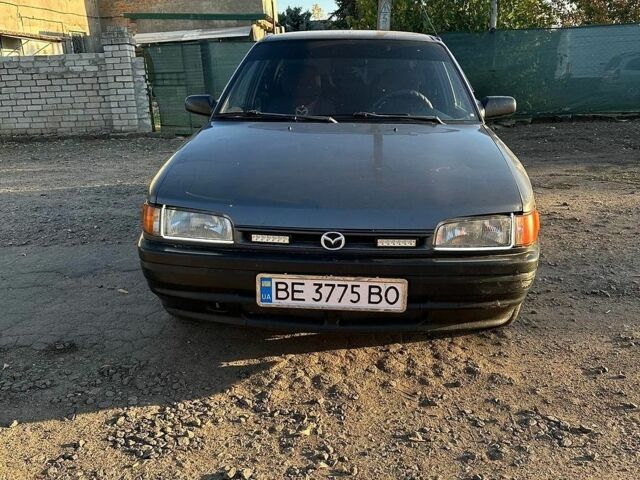 Серый Мазда 323, объемом двигателя 1.7 л и пробегом 270 тыс. км за 1800 $, фото 1 на Automoto.ua