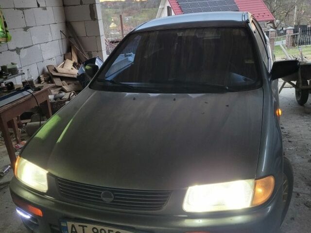 Сірий Мазда 323, об'ємом двигуна 1.5 л та пробігом 328 тис. км за 1299 $, фото 1 на Automoto.ua