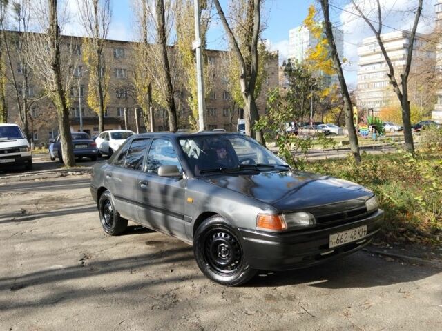 Сірий Мазда 323, об'ємом двигуна 1.3 л та пробігом 300 тис. км за 1500 $, фото 1 на Automoto.ua