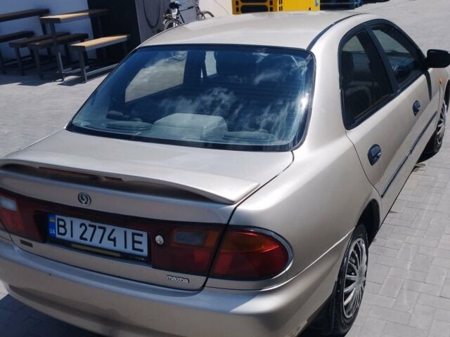 Сірий Мазда 323, об'ємом двигуна 1.5 л та пробігом 390 тис. км за 2300 $, фото 1 на Automoto.ua