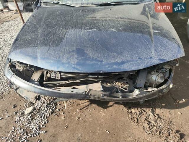 Серый Мазда 323, объемом двигателя 1.8 л и пробегом 100 тыс. км за 750 $, фото 1 на Automoto.ua