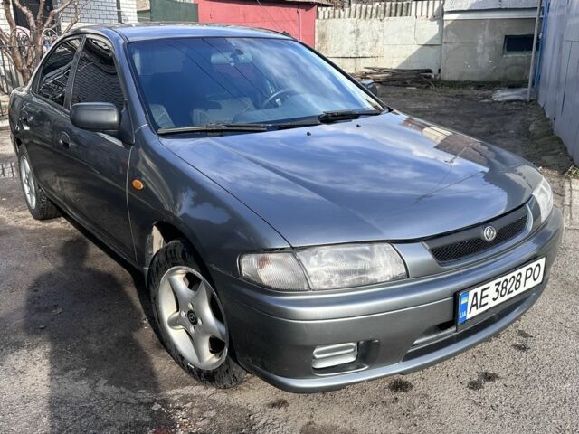 Сірий Мазда 323, об'ємом двигуна 1.5 л та пробігом 400 тис. км за 2500 $, фото 1 на Automoto.ua