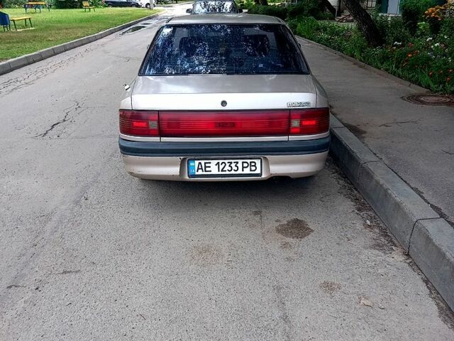 Серый Мазда 323, объемом двигателя 1.6 л и пробегом 0 тыс. км за 1100 $, фото 1 на Automoto.ua