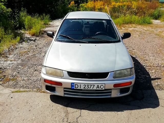 Серый Мазда 323, объемом двигателя 1.5 л и пробегом 270 тыс. км за 2000 $, фото 1 на Automoto.ua