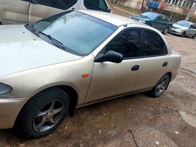 Серый Мазда 323, объемом двигателя 1.5 л и пробегом 220 тыс. км за 2000 $, фото 1 на Automoto.ua