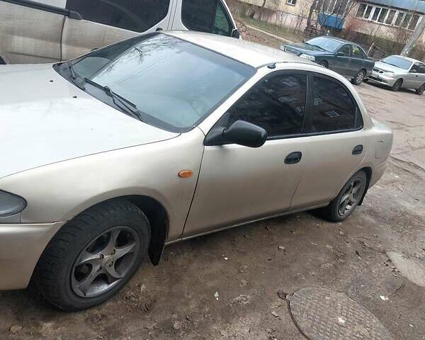 Сірий Мазда 323, об'ємом двигуна 1.5 л та пробігом 280 тис. км за 2400 $, фото 1 на Automoto.ua