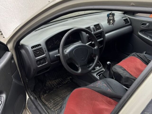 Серый Мазда 323, объемом двигателя 1.5 л и пробегом 3 тыс. км за 2000 $, фото 1 на Automoto.ua