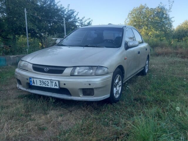Сірий Мазда 323, об'ємом двигуна 0 л та пробігом 253 тис. км за 1699 $, фото 1 на Automoto.ua