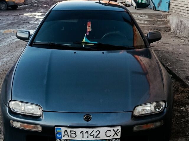 Серый Мазда 323, объемом двигателя 1.5 л и пробегом 200 тыс. км за 1500 $, фото 1 на Automoto.ua
