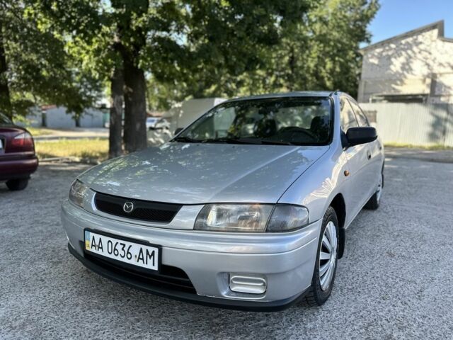 Серый Мазда 323, объемом двигателя 1.5 л и пробегом 307 тыс. км за 2650 $, фото 1 на Automoto.ua