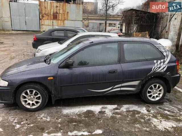 Сірий Мазда 323, об'ємом двигуна 1.5 л та пробігом 265 тис. км за 2300 $, фото 1 на Automoto.ua