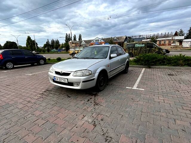 Серый Мазда 323, объемом двигателя 1.5 л и пробегом 250 тыс. км за 2300 $, фото 1 на Automoto.ua