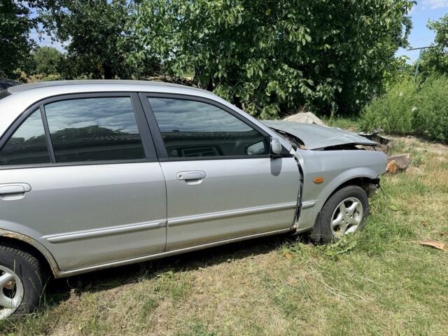 Сірий Мазда 323, об'ємом двигуна 1.6 л та пробігом 250 тис. км за 748 $, фото 1 на Automoto.ua