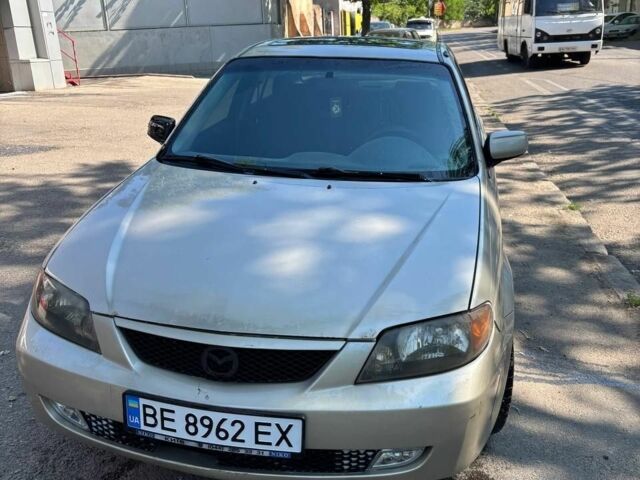 Серый Мазда 323, объемом двигателя 2 л и пробегом 230 тыс. км за 1250 $, фото 1 на Automoto.ua